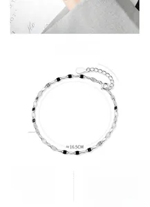 Detail view of S925 sterling silver geometric link chain bracelet with extension and clasp