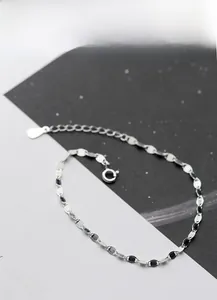 Macro view of S925 sterling silver geometric link bracelet with adjustable extender