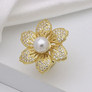 Elegant gold flower ring with micro zircon petals and a large white pearl center