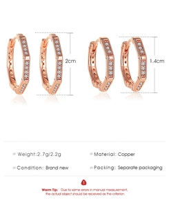 Detailed size comparison of rose gold hexagonal earrings with cubic zirconia inlay