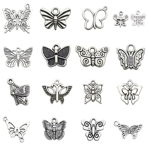 Set of 15 antique silver butterfly charms in various metal alloy designs for DIY jewelry