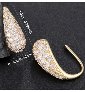 Macro view showing dimensions of waterdrop hook earrings with gold base and zircon stones