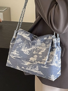 Blue canvas tote bag with traditional Chinese landscape print and silver chain strap