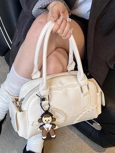 White patent leather bowling bag with letter embossing and cute girl pendant charm