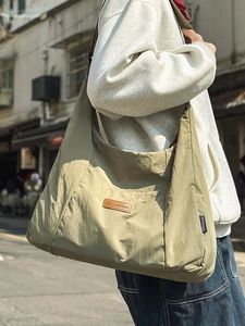 Large capacity olive nylon tote bag for men and women with adjustable shoulder strap