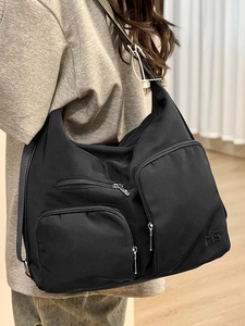 Vielseitige schwarze Nylontasche mit Multi-Taschen-Design für Reise und tägliches Pendeln