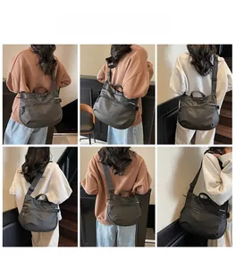 Detailed views of a black waterproof nylon tote bag with adjustable straps and zip pockets