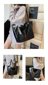 Close-up of black soft leather tote bag featuring a white lace bow detail for casual style