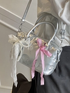 Silver metallic Boston bag with lace pearl bow and pink ribbon in Balletcore style
