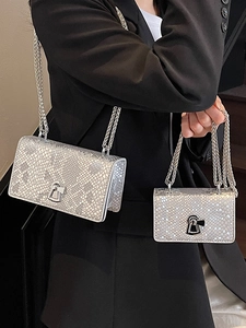 Silver snakeskin pattern crossbody chain bag for women with metallic leather finish