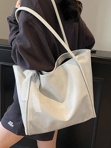 Large capacity soft faux leather tote bag in white with decorative lace bow detail