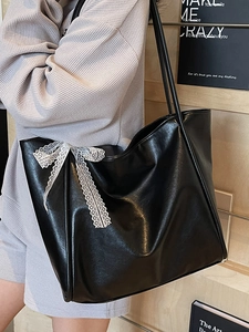 Chic black large capacity faux leather tote bag with white lace bow detail for women