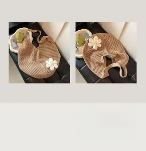 Detail of khaki crochet tote bag featuring a white 3D sunflower and woven texture