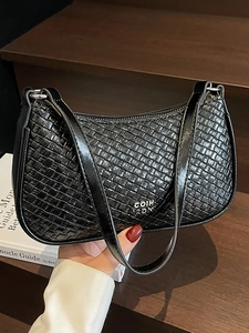 Chic black woven underarm bag for women with minimalist shoulder strap and silver logo