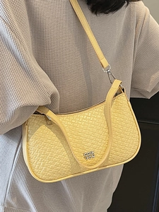 Chic yellow woven underarm bag with metal logo and dual straps for women's fashion