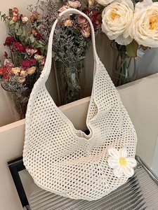 Bohemian cream crochet shoulder bag with hollow knit design and 3D daisy flower detail