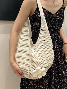 Chic woven shoulder tote bag with hollow crochet design and floral detail for women