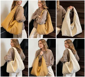 Viste dettagliate di borse tote oversize giallo senape e crema in tessuto canvas di alta qualità