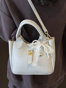 Chic light blue lychee pattern bucket bag with pearl bow and lace ribbon detail