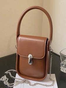 Brown leather crossbody phone bag with silver chain strap and capsule metal buckle
