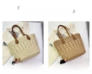 Detail of hand-woven straw tote bags in beige and khaki with leather shoulder straps