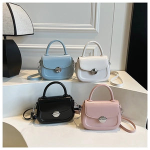 Borse a sella minimaliste in pelle cerata in quattro colori con fibbie in metallo argento
