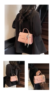Pink minimalist crossbody square bag with a decorative tassel and plaid silk scarf detail