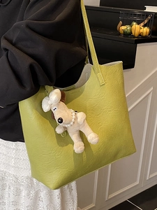 Minimalist large lime green leather tote bag with plush puppy pendant for women