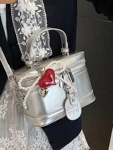Retro silver metallic box handbag with top handle and decorative red heart charms