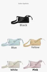 Detail view of five solid color PU leather square crossbody bags with adjustable straps