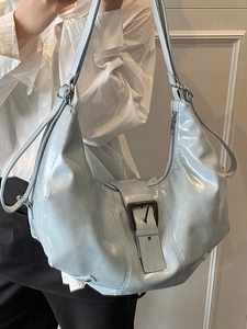 Retro light blue leather hobo bag with vintage buckle in a spacious U-shaped design