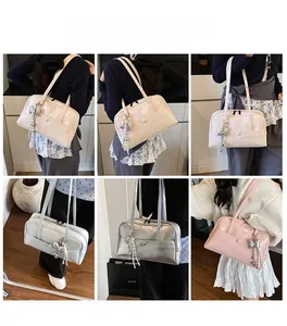 Boston bag showcase in four colors featuring sleek wax leather and trendy bow charms