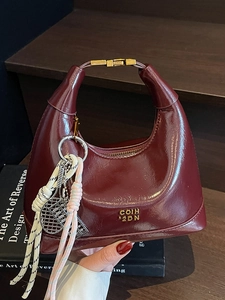 French style burgundy oil wax leather dumpling handbag with tassel for women's daily commute