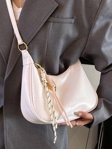 White oily leather hobo tote bag for women with woven charm and fashion logo print