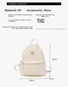 Detailed size specifications and 26x32x17cm dimensions of the white PU backpack