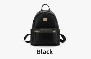 Detail view of black retro backpack featuring white contrast stitching and MKBV gold plate