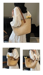 Close-up of the natural beige woven texture and brown leather strap on the tote bag