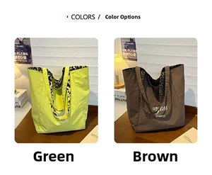 Detail of tote bag showing green and brown fabrics with leopard print lining