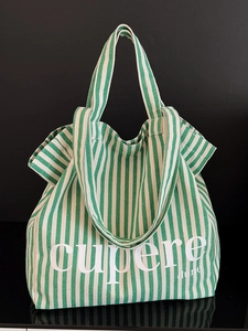 Large green and white striped canvas tote bag with Cupere Dune letter printing
