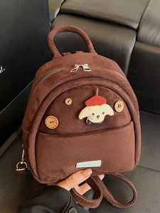 Zainetto in camoscio marrone con toppa a cane cartoon e bottoni in legno decorativi