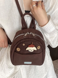 Mini zaino marrone in velluto a coste con patch a cucciolo bianco e bottoni in legno da donna