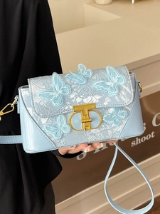 Elegant light blue square bag with 3D butterfly appliques and lace details