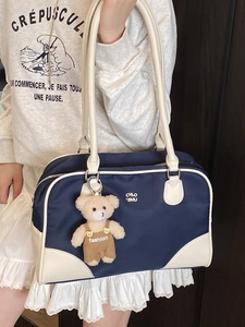 Retro contrast shoulder bag in blue and beige nylon with cute plush bear charm