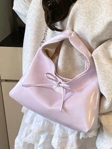 Chic lavender dumpling handbag with ribbon bow and silver chain strap for women