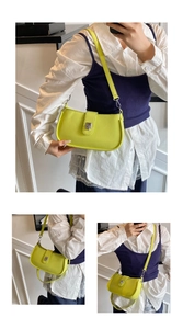 Detail of neon green oil wax leather underarm bag with stylish silver metal buckle