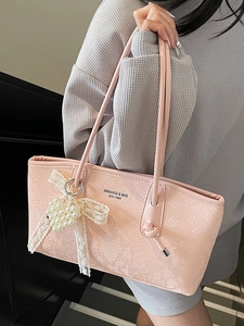Sac à bandoulière rose motif serpent pour femme avec nœud dentelle et pendentif cœur