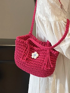 Handmade magenta crochet shoulder bag with 3D flower detail and stylish tassel trim
