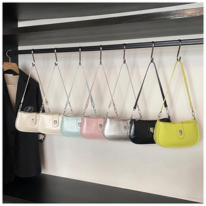 Selection of glossy oil wax leather underarm bags in seven vibrant and stylish colors