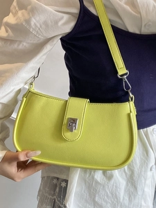 Minimalist lime green oil wax leather underarm bag for women with silver metal buckle