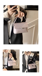Detail of light purple oil wax leather square bag showing the silver twist lock and handle